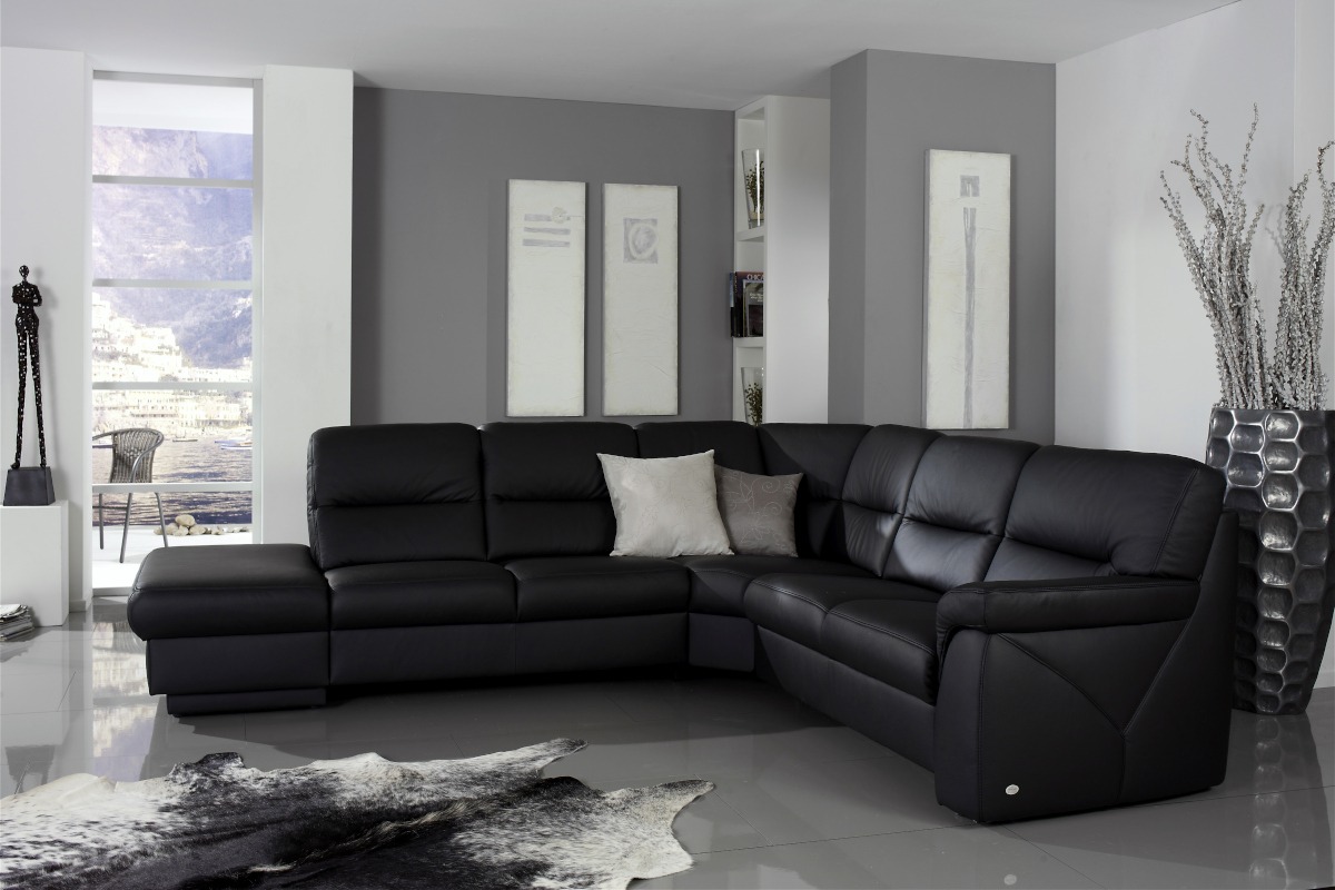 Schwarzes Hochlehnersofa in Leder und mit Einzug im Rücken